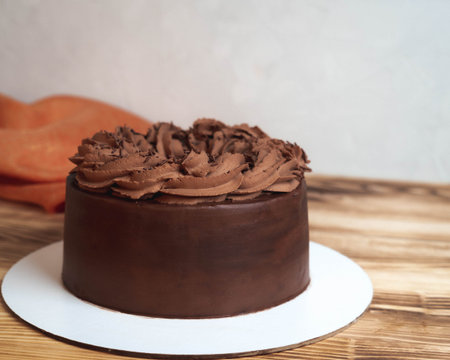 chocolate cake with chocolate cream and orange platinam