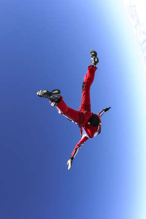 The girl parachutist in free style の写真素材