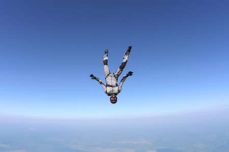 Sportsman skydiver in free style の写真素材