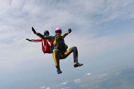 Two sports skydiver in freefall.の写真素材
