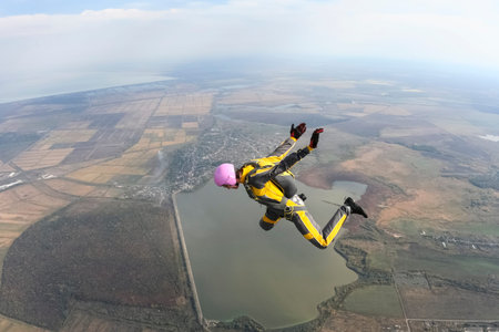 The girl parachutist in free style 