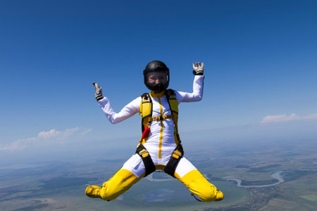 The girl parachutist in free fall.
