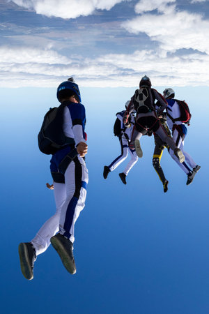 Sports parachutist build a figure in free fall の写真素材
