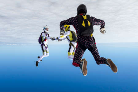 Group collects figure skydivers in freefall.の写真素材