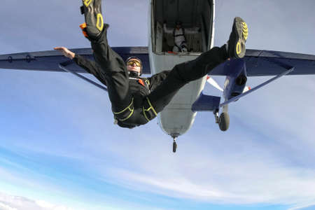 Parachutist jumps out of an airplane.の写真素材
