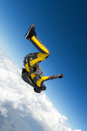 A girl performs in a free fall free style.の写真素材