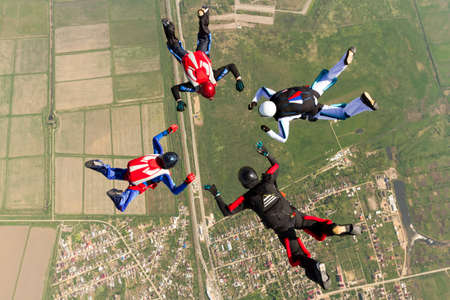 Sports parachutist build a figure in free fall.の写真素材