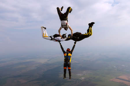 Group collects figure skydivers in freefall.の写真素材