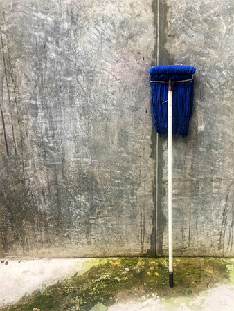 Dirty blue mop after cleaning the house.の写真素材