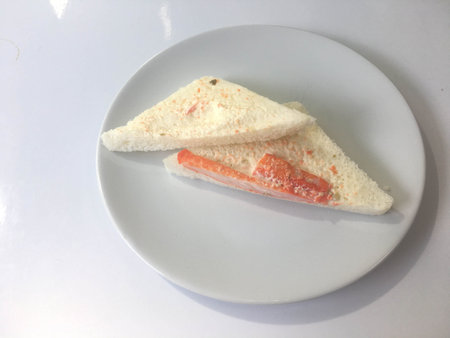 Crab Sandwich in Ceramic White Plateの写真素材