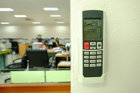 Red button Air conditional Remote control and 25 degree Celsius is best for save energy,Save Energy,Save World,Save moneyの写真素材