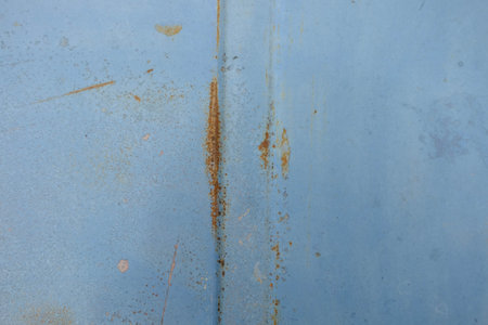 Metal texture with scratches and cracks,Rusty metal with blue paintの写真素材