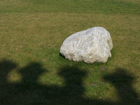 Lonely White Stone over Green Grass Gardenの写真素材