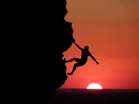 climber to conquer the peakの写真素材