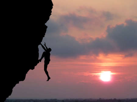 climber to conquer the peakの写真素材