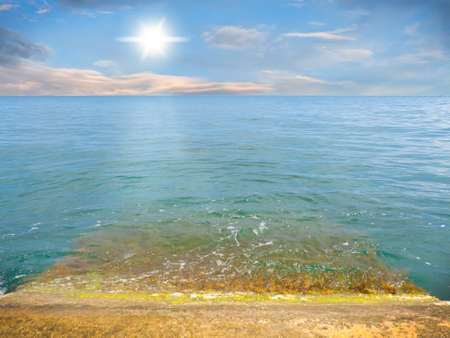 Sea and rock at the sunset. Nature composition.の写真素材