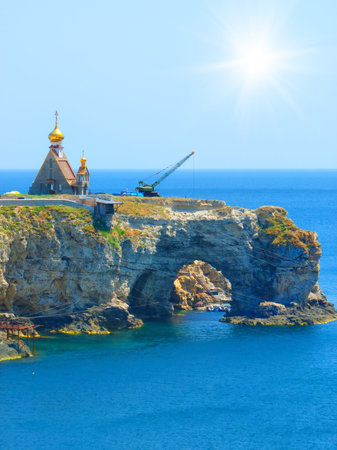 church stands on the edge of a cliff into the sea leaving. landscapeの写真素材