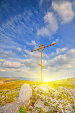 Christian cross on a mountaintop. mountain landscapeの写真素材
