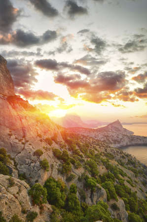 Beautiful seascape. Sea and rock at the sunset.の写真素材