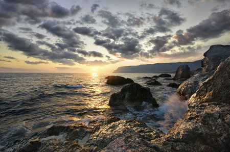 Rocks and sea. Dramatic scene. Composition of nature.の写真素材