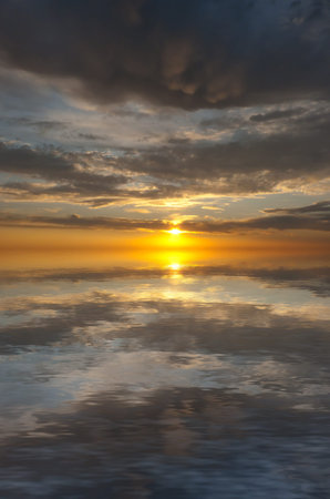 Expanse of the sea against the sunset sky. Beautiful seascape. Natural composition.
