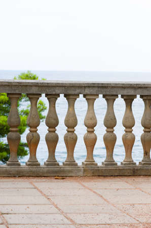 seascape visible through old columnsの写真素材