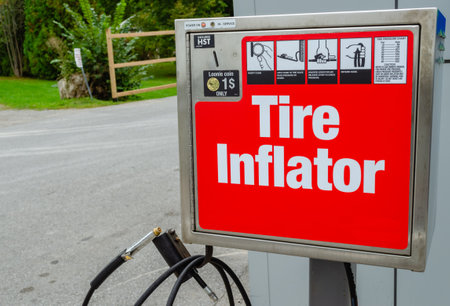 Close-up of a red gas station tire inflator machine.の写真素材