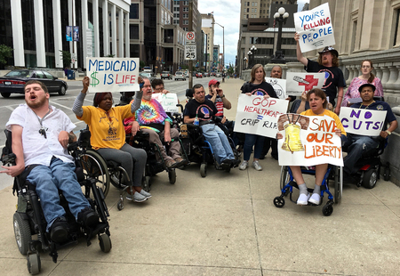INDIANAPOLIS, IN/USA â JUNE 26, 2017: Members of ADAPT of Indiana fear the loss of Medicaid money will mean more of Indiana's disabled will have to go back to living in health care facilities.のeditorial素材