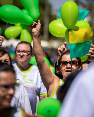 AraÃ§atuba, State of SÃ£o Paulo, Brazil, September 2019 - Brazilians in patriotic manifestation - worship of the colors of the Brazilian flag - Brazilian independence day green and yellow.のeditorial素材