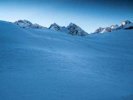 A path through fresh powder snowの写真素材