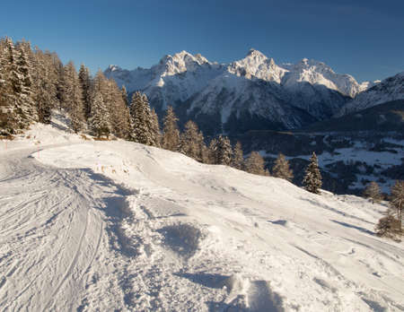 Toboggan run with mountain panorama, Engadine, Switzerlandの写真素材