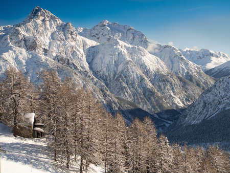 Ski lift in front of the panorama of the Sesvenna mountain group,Engadine, Switzerlandの写真素材