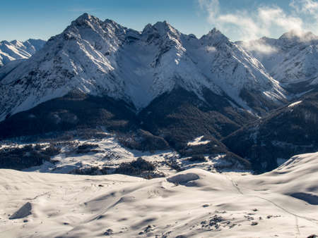 The Inn valley with the panorama of the Sesvenna mountain group,Engadine, Switzerlandの写真素材