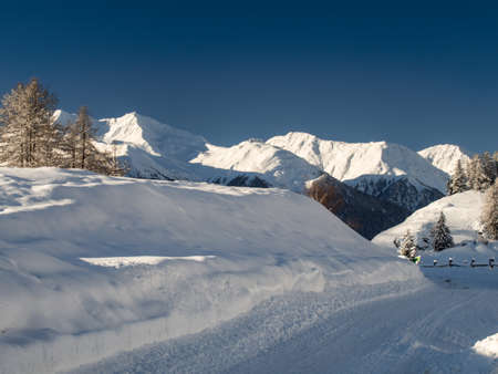 Fresh snow in a high mountain region in the Engadine, Switzerlandの写真素材