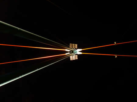 Part of modern bridge with attractive illumination in Frankfurt, Germanyの写真素材