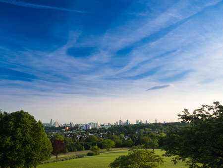 The skyline of business buildings in Frankfurt, Germany, seen from the Lohrbergの写真素材
