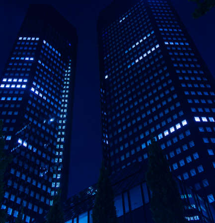 Dynamic skyscrapers at night in the center of Frankfurt, Germanyのeditorial素材