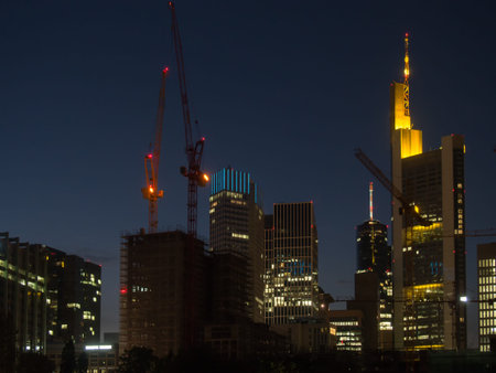 Office buildings in Frankfurt, Germany, at nightの写真素材