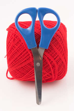 Scissors standing next to woolの写真素材