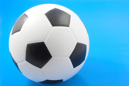 Soccer ball on blue background