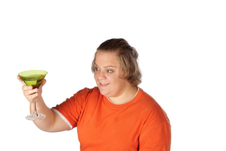 Young model with martini glass proposing a toastの写真素材