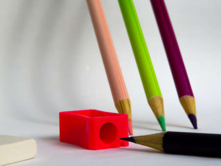 colored pencils and sharpenerの写真素材