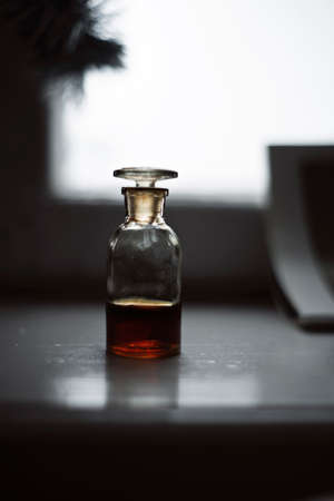 Vintage bottle with propolis tincture. Selective focus. Close upの写真素材