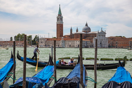 Gondolas in Venice with Isola San Giorgio, Italyのeditorial素材
