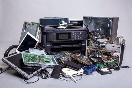 Heap of old computer devices and hardware parts for disposal and recycling