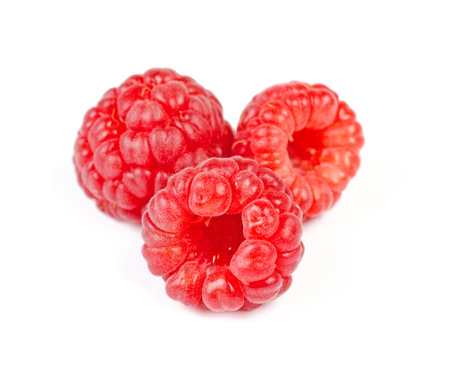Heap of Juicy Red Ripe Raspberry, Isolated on White Background