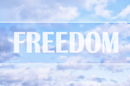 Freedom Word on Blue Sky as Abstract Backgroundの写真素材