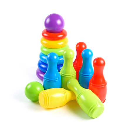 Colorful Plastic Skittles and Pyramid Toys Isolated on White Backgroundの写真素材