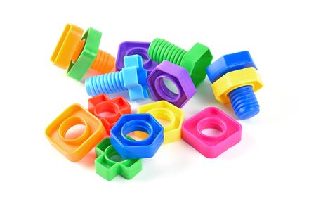 Set of Colorful Plastic Screw and Bolts as Child Toys. Isolated on White Backgroundの写真素材