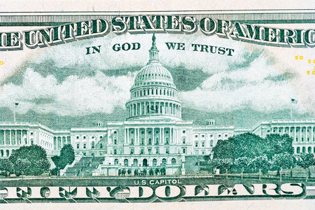 close-up 50 US dollar bills with in God we trust text. Backgroundの写真素材